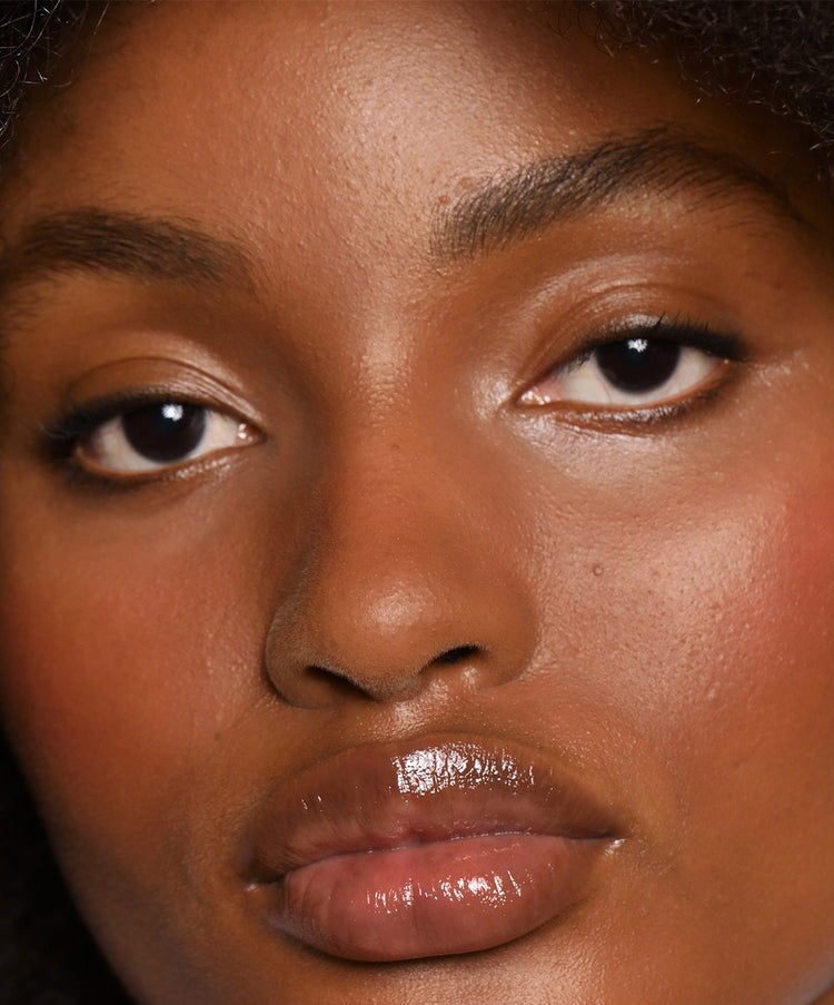 | desc: | text: light Blessing wears Lip Gloss in shade Sepia
