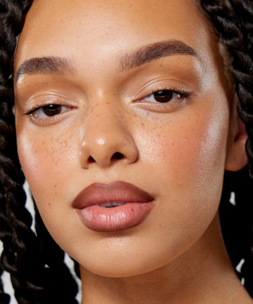 | desc: Model wears Lip Sculpt in Suede